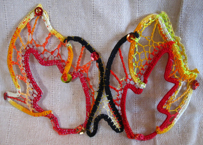 Flame Eyes needlelace mask, handmade by C. Buffalo Larkin