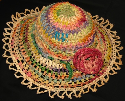 Multicolor raffia sun hat with crocheted rose and laced edging, crocheted by C. Buffalo Larkin