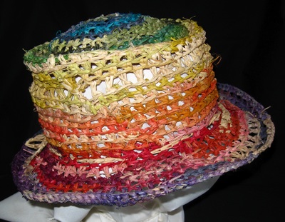 Out of Africa Hat (rainbow colors), crocheted raffia by C. Buffalo Larkin