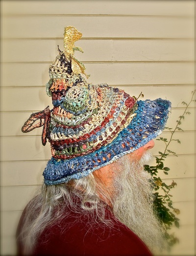Wizard Hat with Butterflies (side view), crocheted raffia by C. Buffalo Larkin