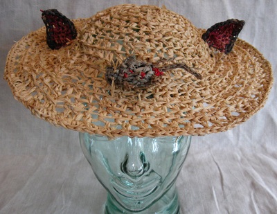 Cat Shepherdess Hat with Dead Mouse, crocheted raffia by C. Buffalo Larkin