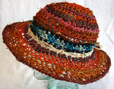 Earthtone Lady Di Hat, crocheted raffia by C. Buffalo Larkin