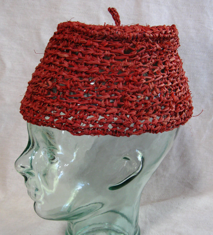 Red Fez, crocheted raffia by C. Buffalo Larkin