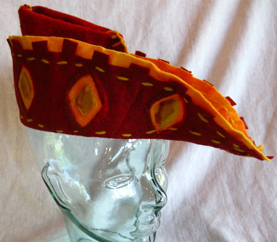 Robin Hood Hat (red and yellow felt), made by C. Buffalo Larkin